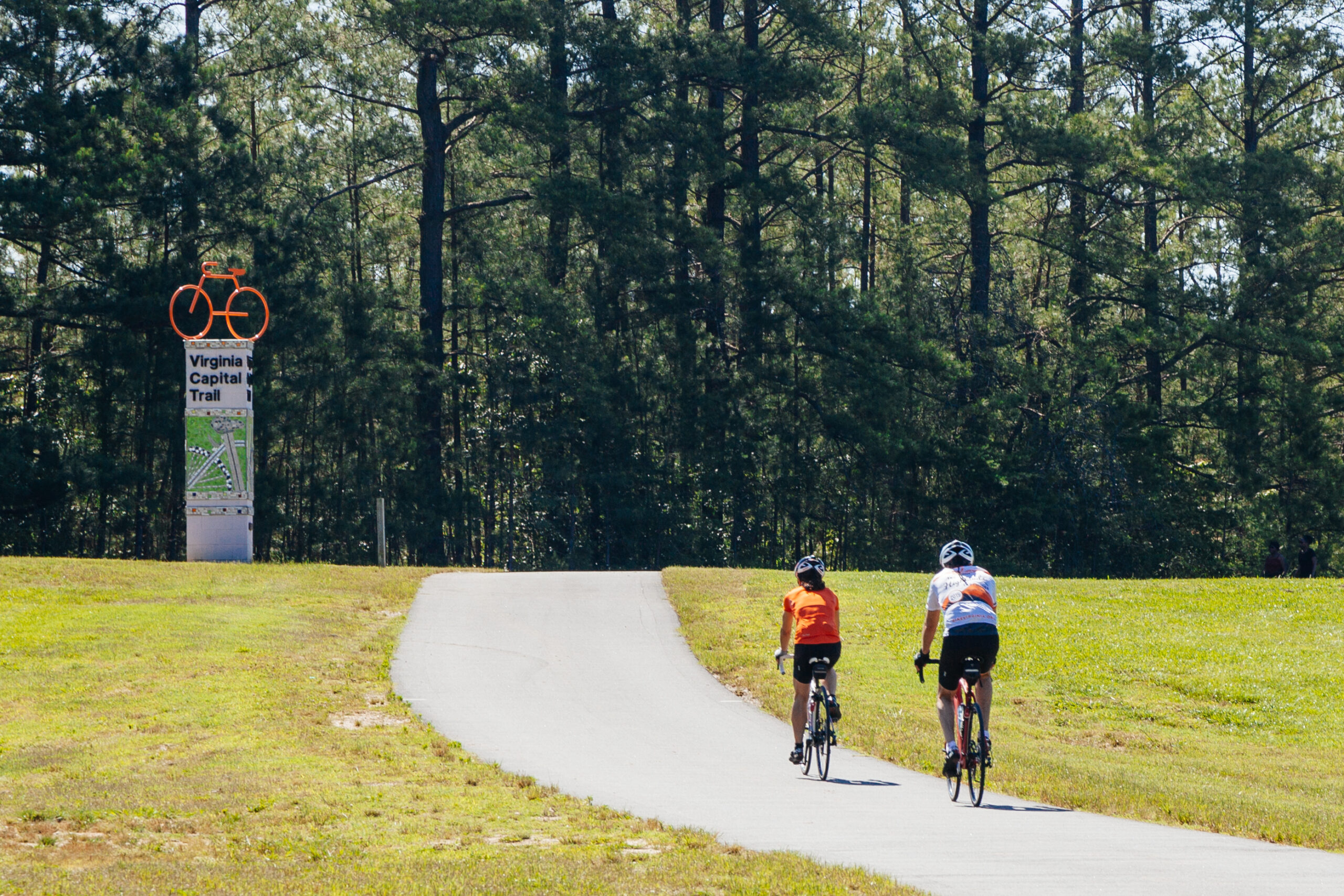 Bike riders on Virginia Capital Trail going through Dorey Park