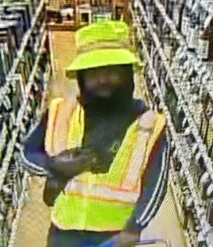 A person wearing high visibility clothing in a Virginia ABC Store.