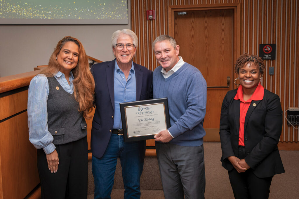 Officials recognize a recipient of the Henrico Heart of Service Awards.