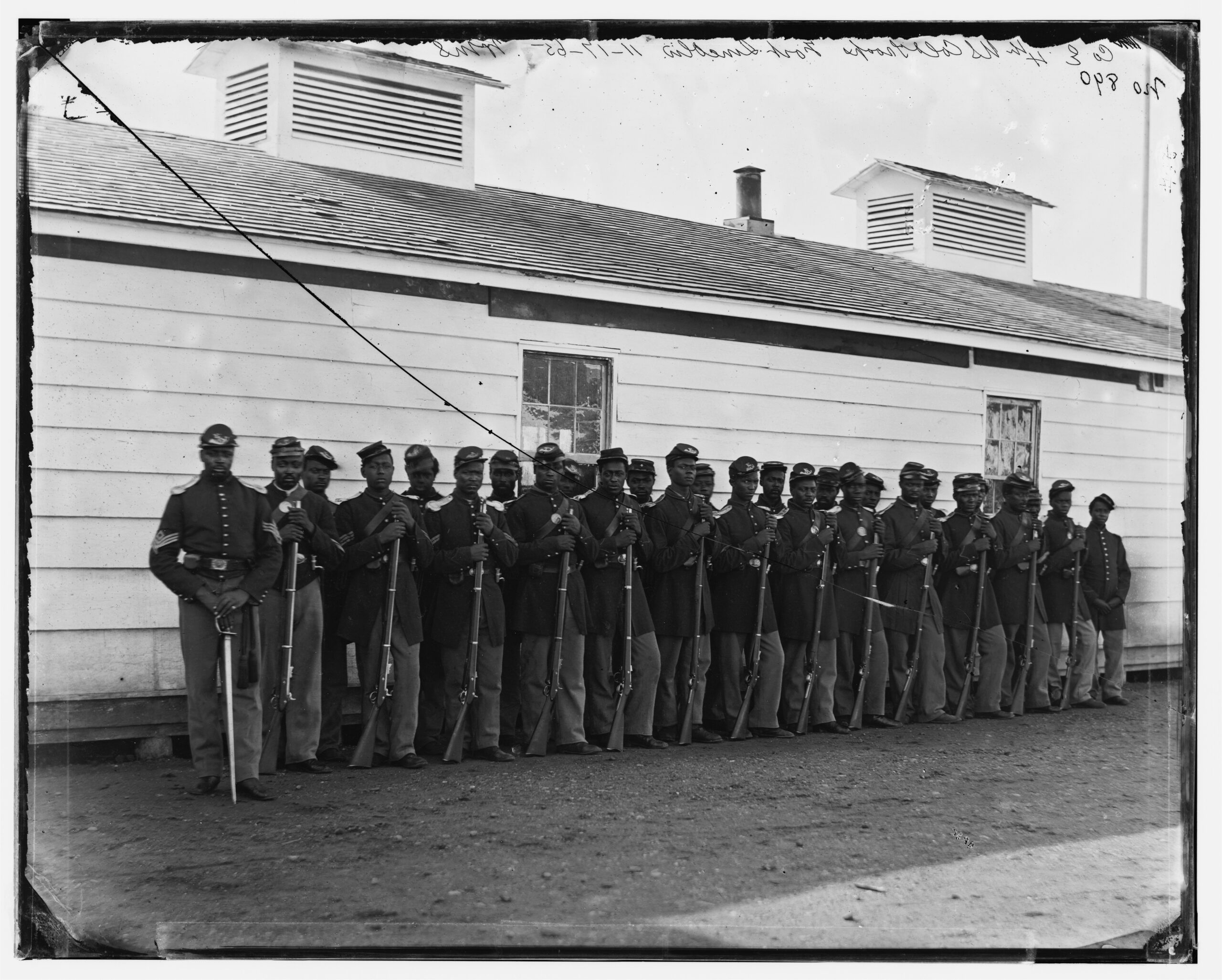 Members of Company E. 4th United States Colored Troops at Fort Lincoln, 1862-1865). This regiment was part of Colonel Samuel Duncan’s brigade and participated in the Battle of New Market Heights