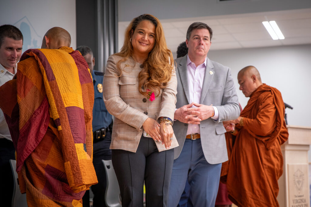 Henrico Supervisor Misty Roundtree shows the peace bracelet she received from Buddhist monks.