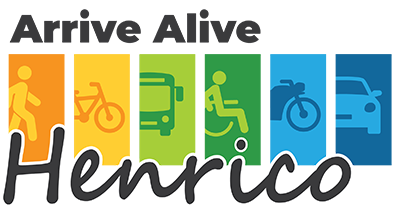 Rectangle logo with black text of Arrive Alive above & Henrico in cursive under a rectangle graphic of 6 horizontal rectangles: orange with silhouette of person walking, light orange with bicycle silhouette, light green with bus silhouette, dark green with handicap symbol in silhouette, light blue with motorcycle silhouette, and dark blue with car silhouette.