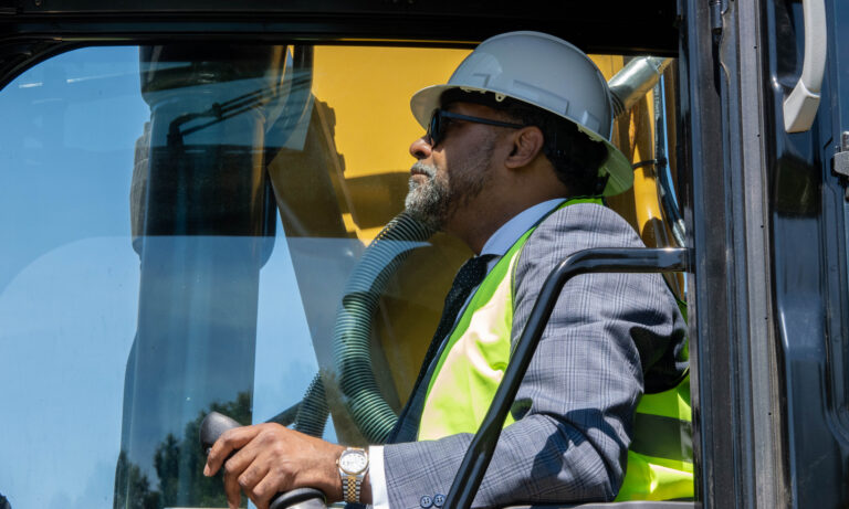 Henrico Supervisor Roscoe D. Cooper III operates an excavator.