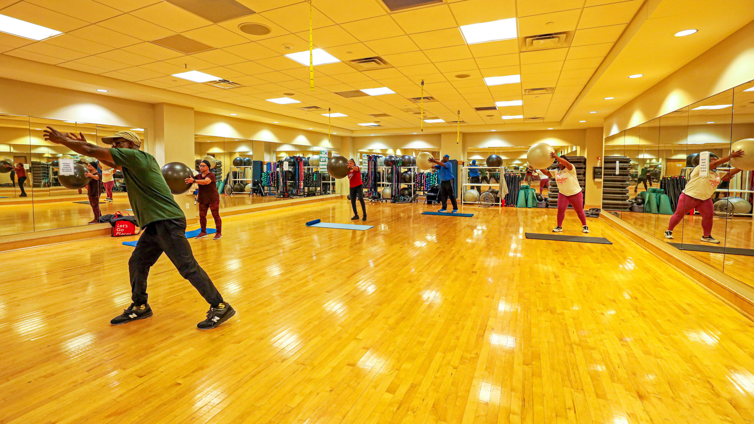 People working out with exercise balls 