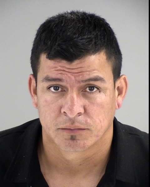 Image shows a Hispanic man with dark hair