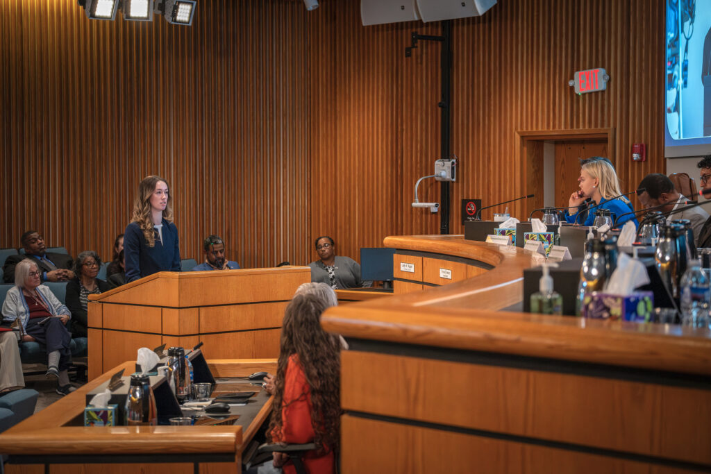 High school students speak at a mock Board of Supervisors meeting for Student Government Day.