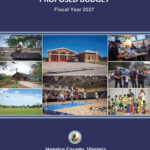 Cover of the budget document with photos of government facilities.