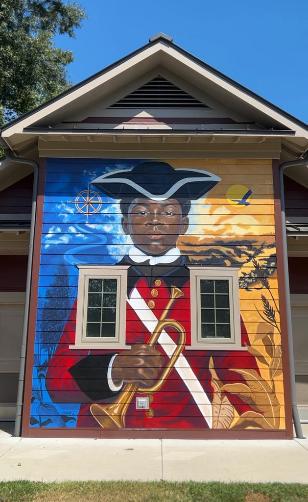 Mural of London Pleasants on the wall at Four Mile Creek Park.