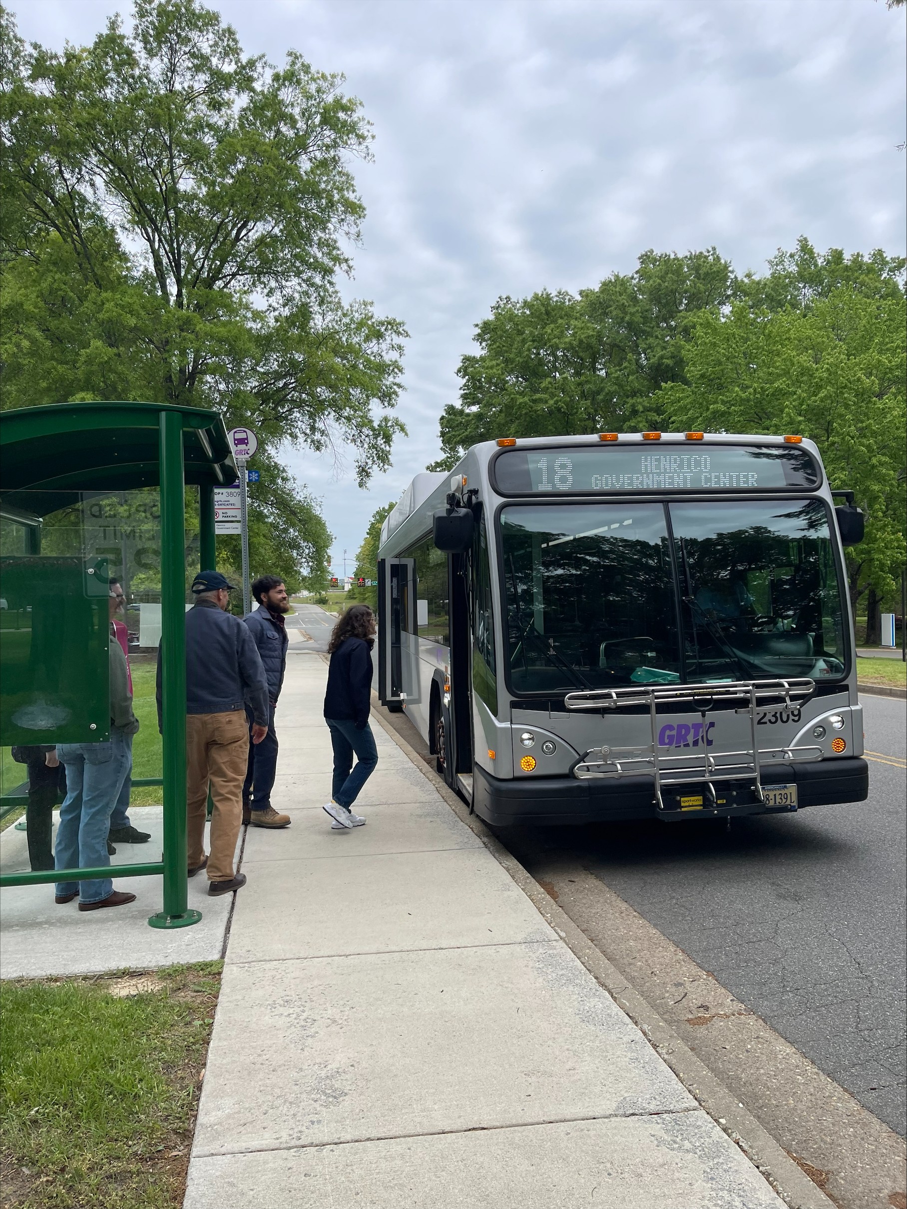 Transit riders boarding GRTC's route 18 at the Western Government center. 