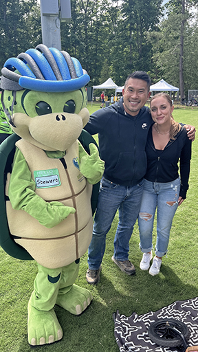Stewart the turtle with event participants.