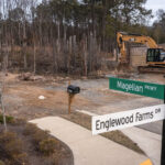 Photo of the end of Magellan Parkway at Englewood Farms Drive.