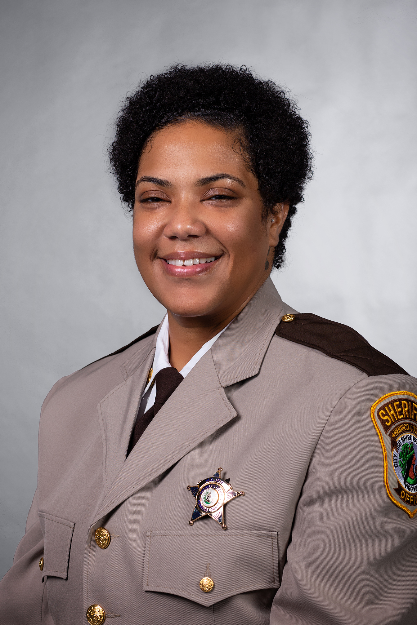 Woman in uniform smiling