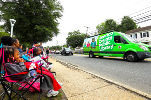 HCPL Van driving down the road in a parade