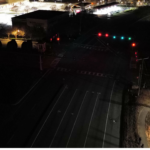 Intersection of Nuckols and Twin Hickory before the installation of solar lights. The red traffic lights can be seen but most of the road is in dark shadows.