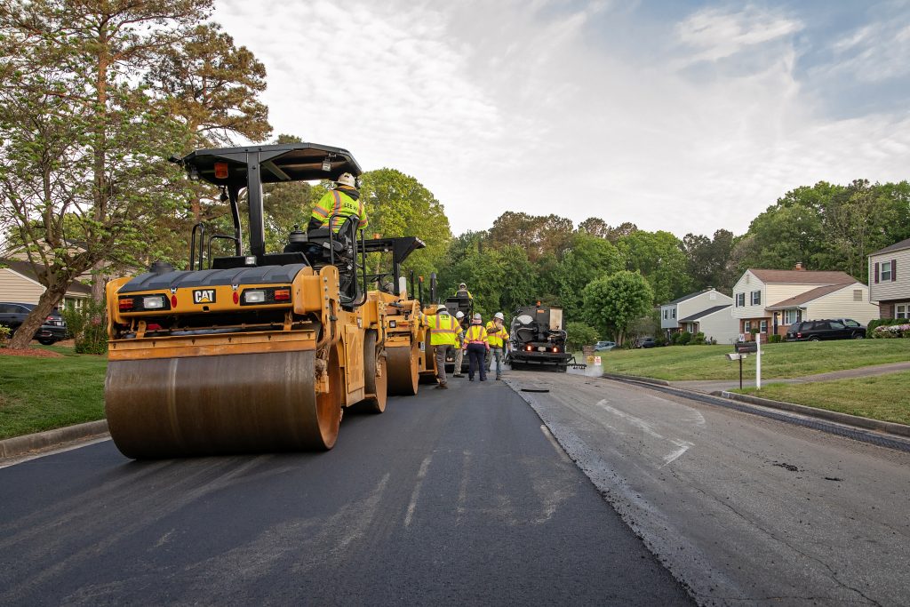 3 steam rollers on new pavement