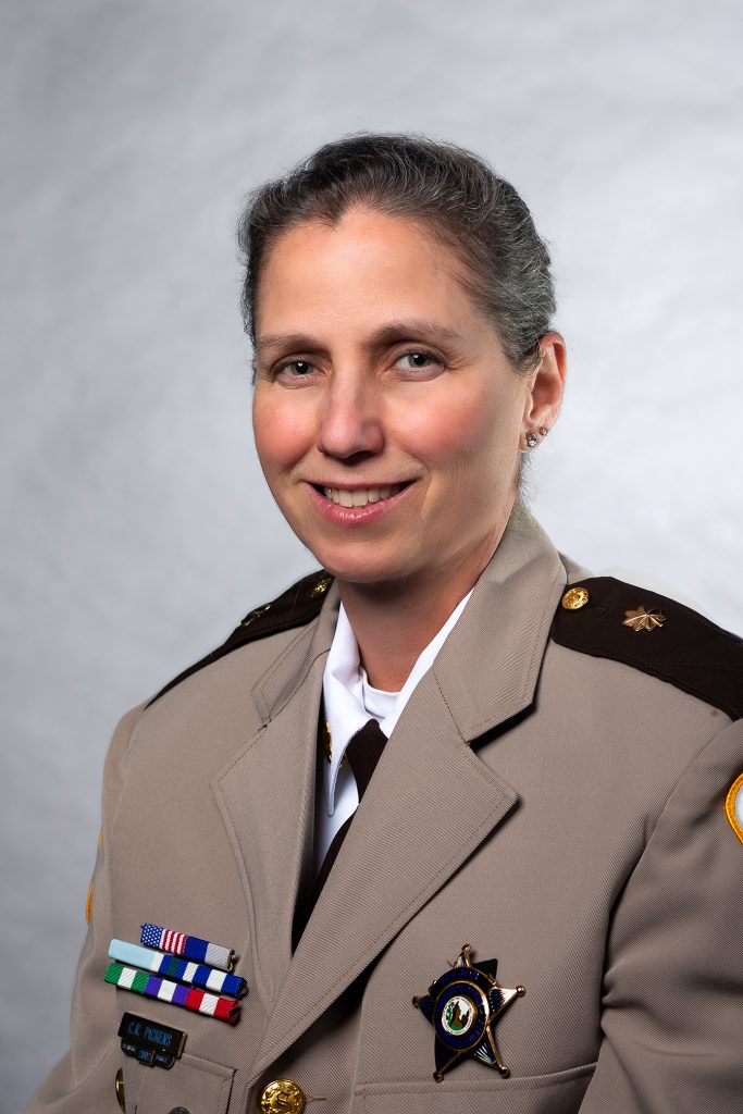 Woman in uniform smiling