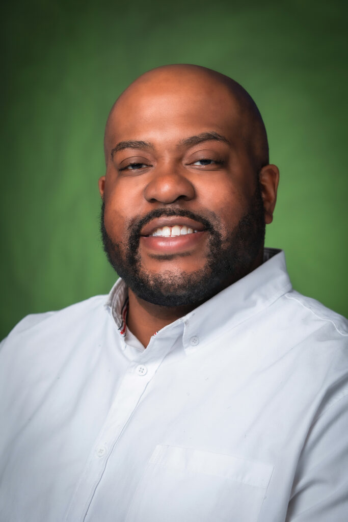 Professional portrait of Elliott Reed, a member of the 2026 Sustainability and Resilience Advisory Committee.