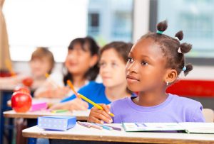 children listening attentively in school