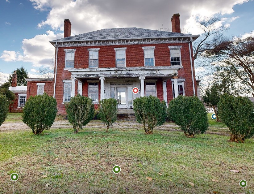 A screenshot shows a red brick farm house with clickable dots to navigate. Click the photo to go to the virtual tour.