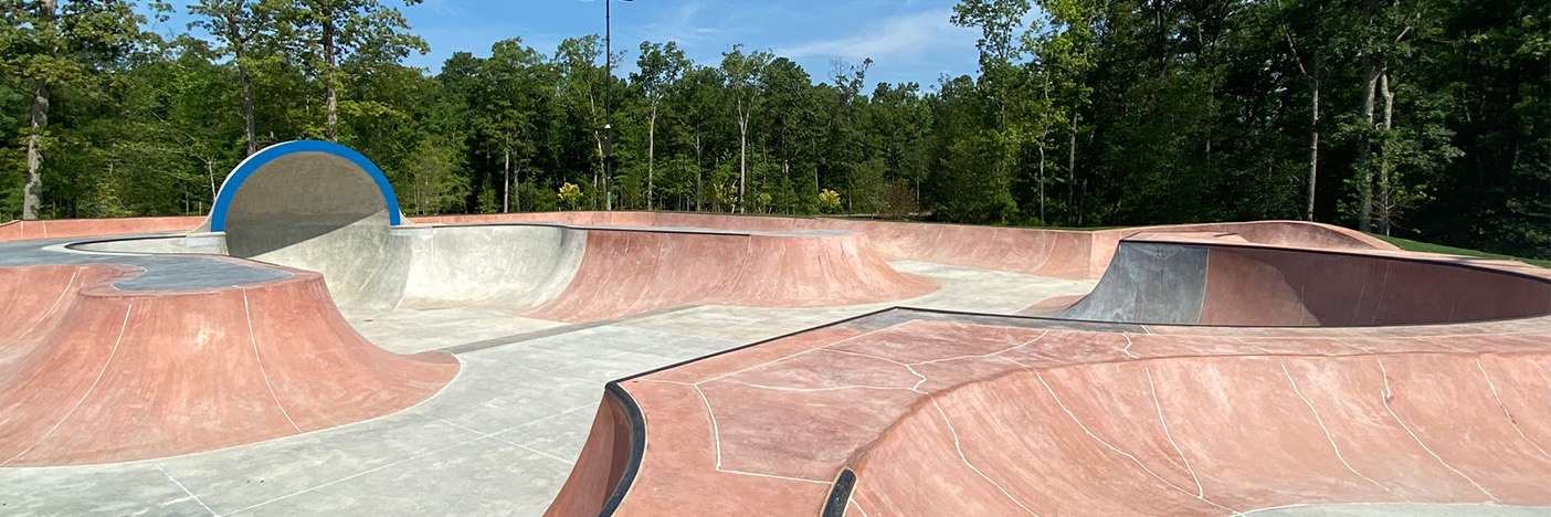 Flow bowl for skates and bikes, concrete area with bowls and slopes to ride.