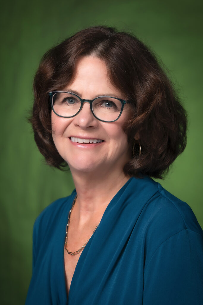 Professional portrait of Marilee Tretina, a member of the 2026 Sustainability and Resilience Advisory Committee.