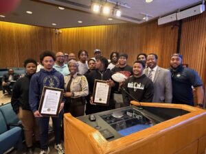 Varina High School 2025 Blue Devils Football Team with Varina District Supervisor Tyrone Nelson