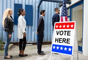 people standing in line to vote